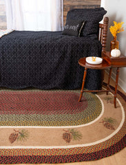 Braided area rug with pinecone printed design in country style bedroom