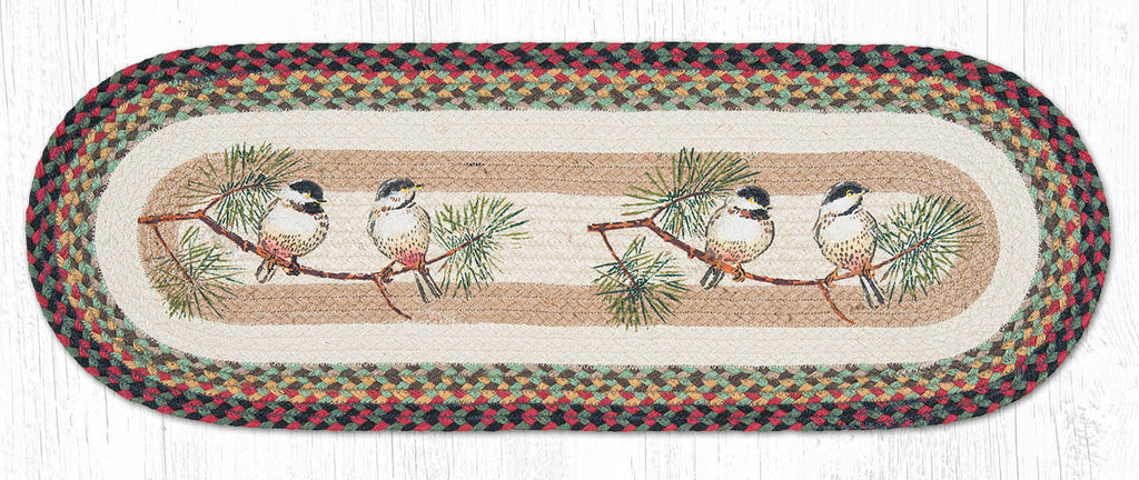 Table runner with chickadee on branch design.