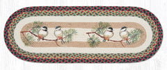 Table runner with chickadee on branch design.