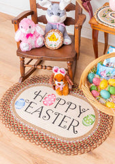 Hoppy Easter rug with Easter Egg design made from braided jute with kid's easter basket and rocking chair