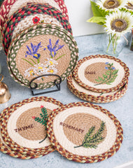 Braided jute trivets with herb designs of sage, thyme, and rosemary