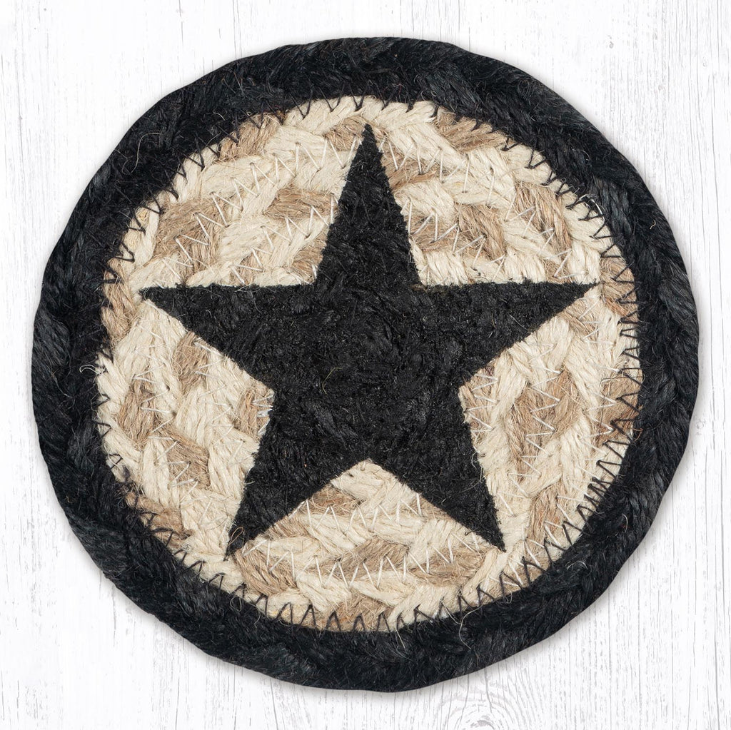 Braided jute round coaster with black and grey border and black star in the center of a tan background. 