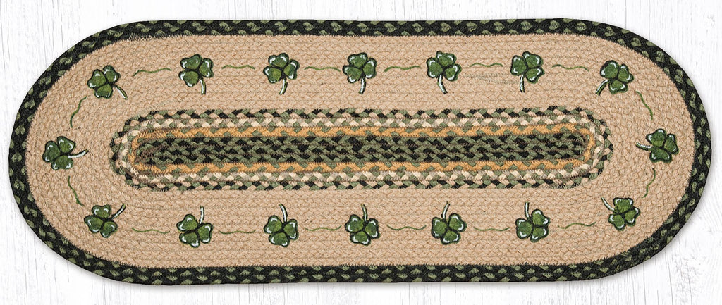 Table runner with shamrock border design, made from braided jute.