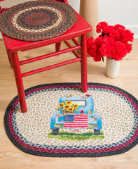 Rug with patriotic Americana truck with flag and sunflowers. 