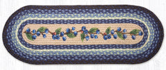 Blueberry table runner made from braided jute with blue, black, and cream colors. 
