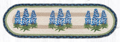 Bluebonnet design stair tread or small table runner with blue, green and tan colors. 
