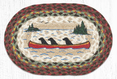 placemat with black labs in a canoe on a lake 