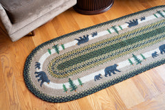 Black bear and Timber Trees design on a jute braided 2x6 rug