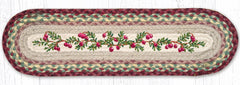 Stair tread with cranberry and leaf design with red, green, and tan braided jute.